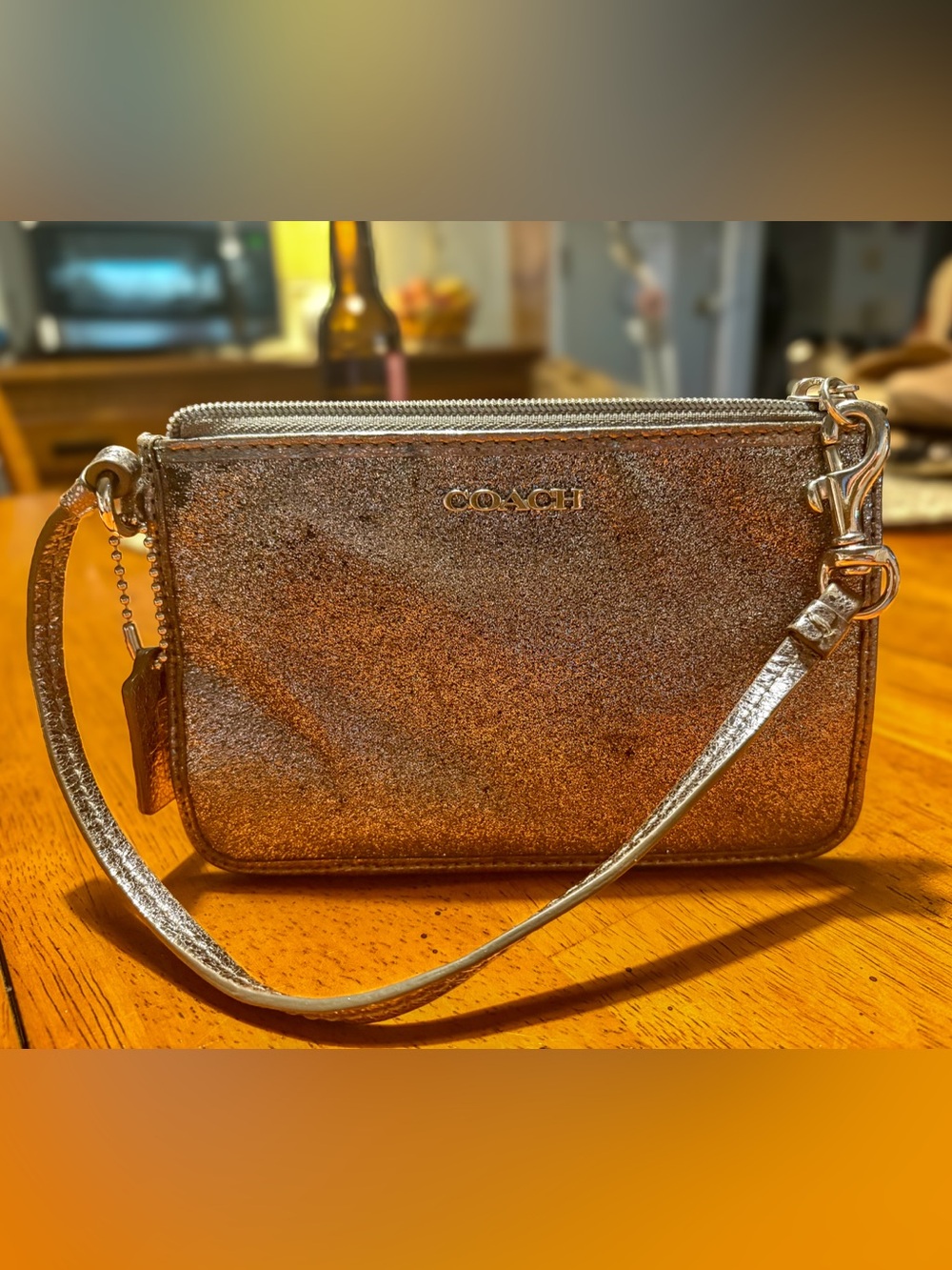 COACH Metallic Silver Wristlet Clutch with Silver Logo